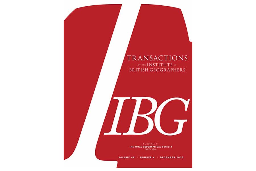 Cover of TIBG journal: White letters on a red background.