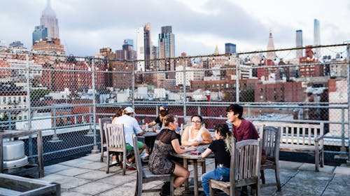 Student Life - University Resources Living at NS People Table Rooftop