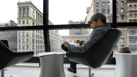 A student studies in one of the student lounges.