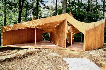 Large wooden structure with two rooms