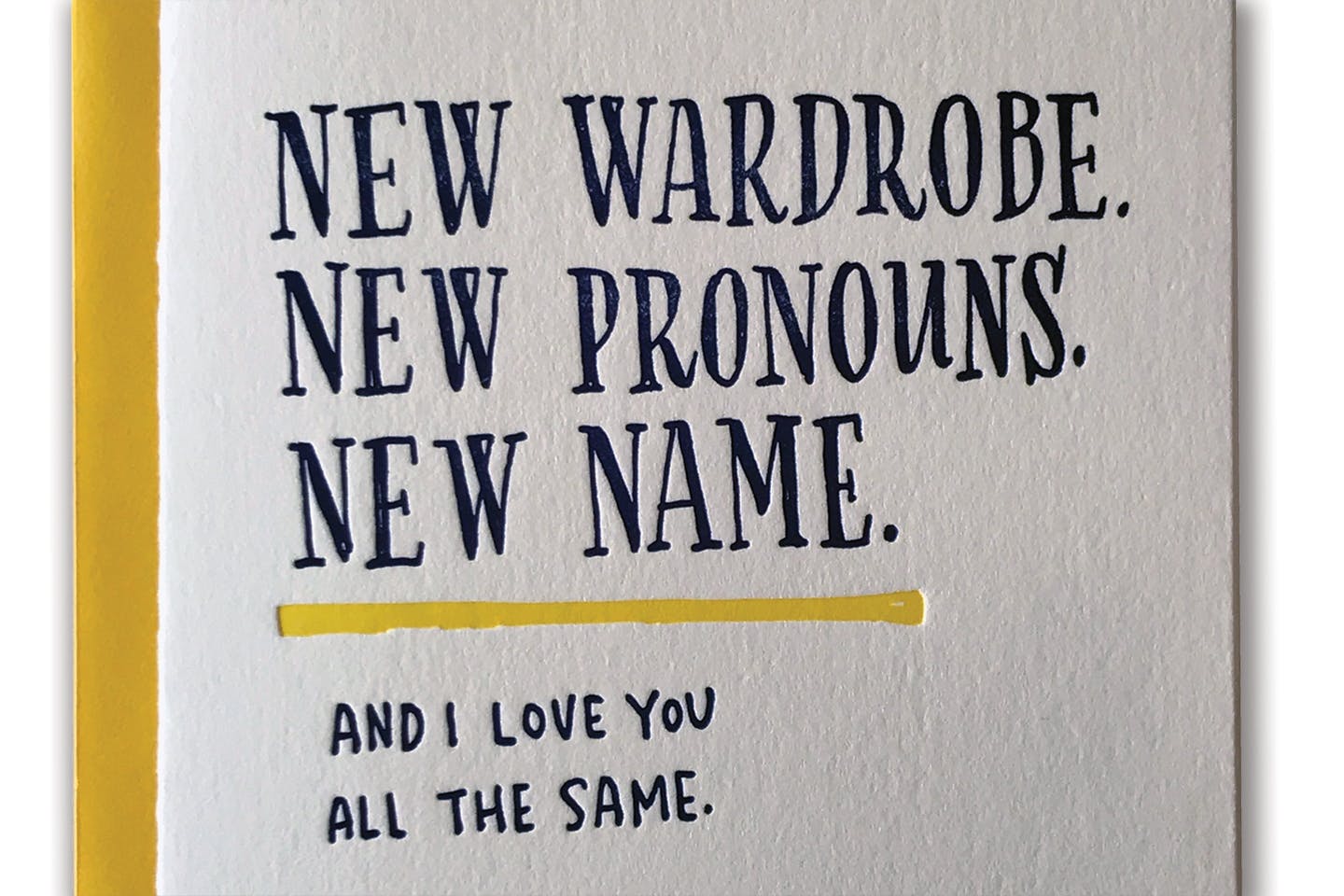 A hand-lettered greeting card reading: “New pronouns, new wardrobe, new name. And I love you all the same.”