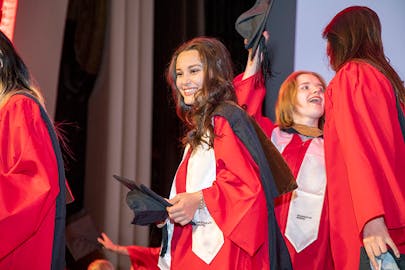 Students celebrate commencement together.