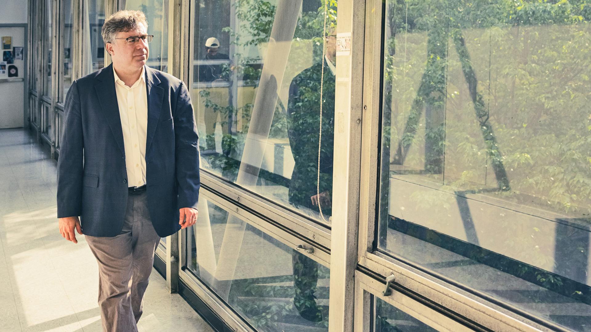 Blake Eskin walking down hallway