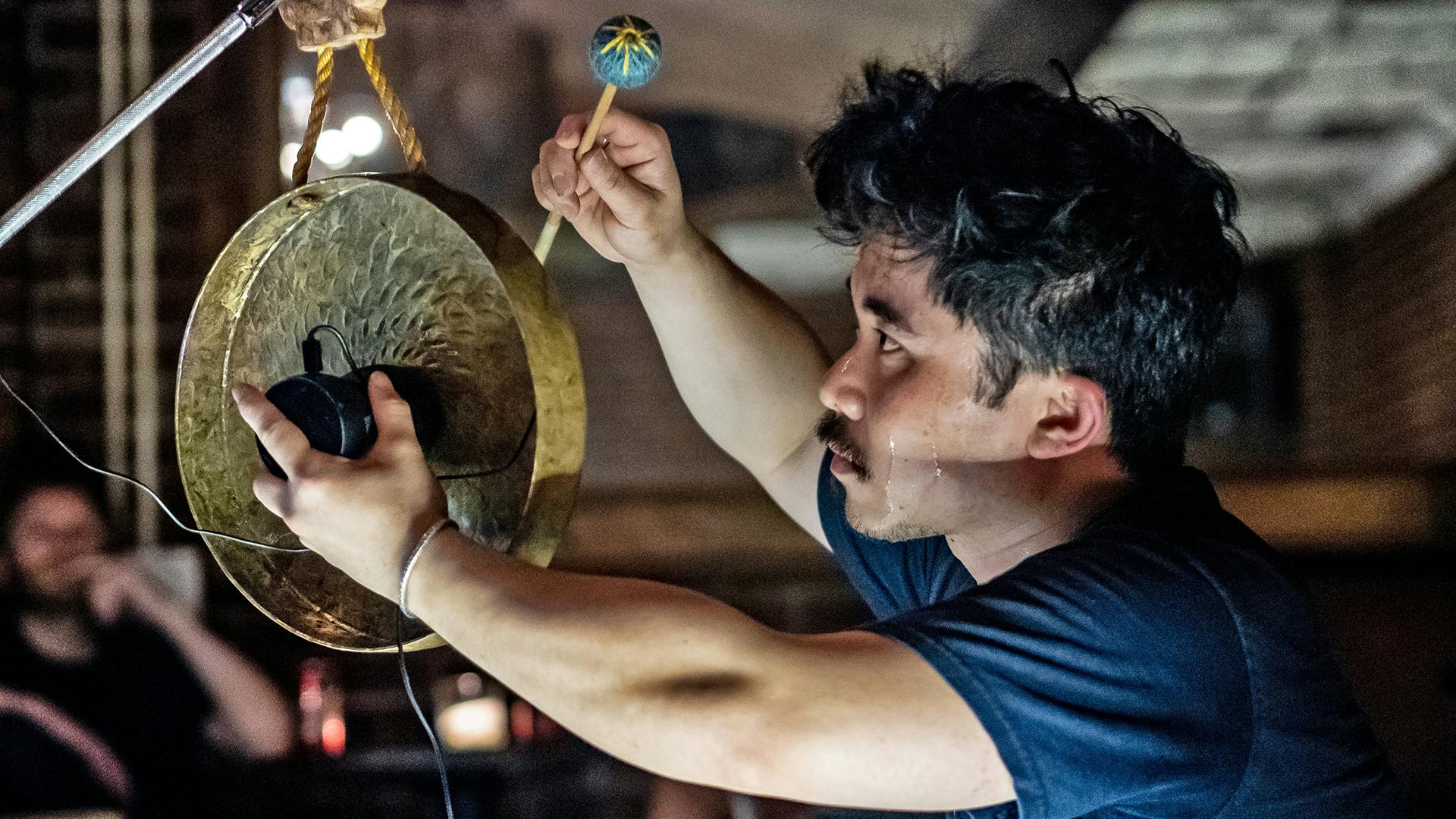 Levy Lorenzo performs music on stage