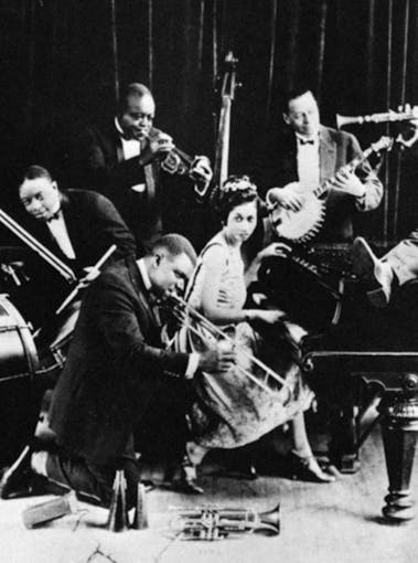 Jazz musicians perform on a stage in 1941