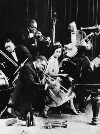 Jazz musicians perform on a stage in 1941