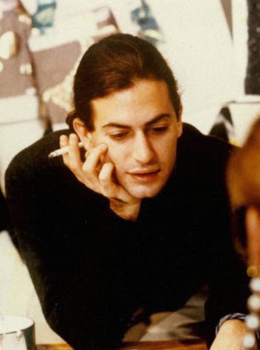 Marc Jacobs, an alumnus of Parsons School of Design, smokes a cigarette in the 1980s