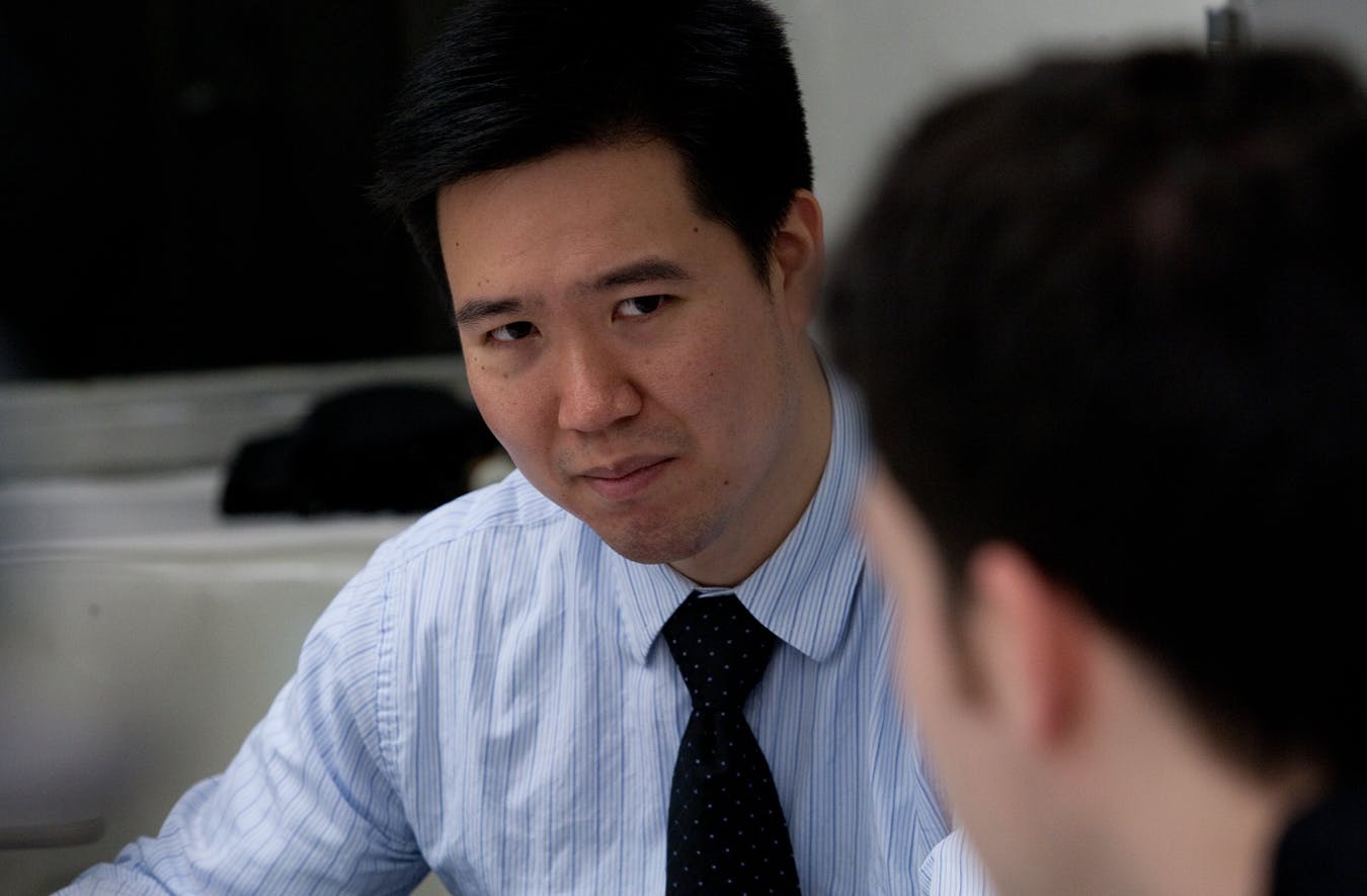 An advisor speaking with a student.