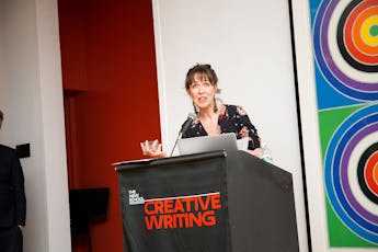 Writer at podium
