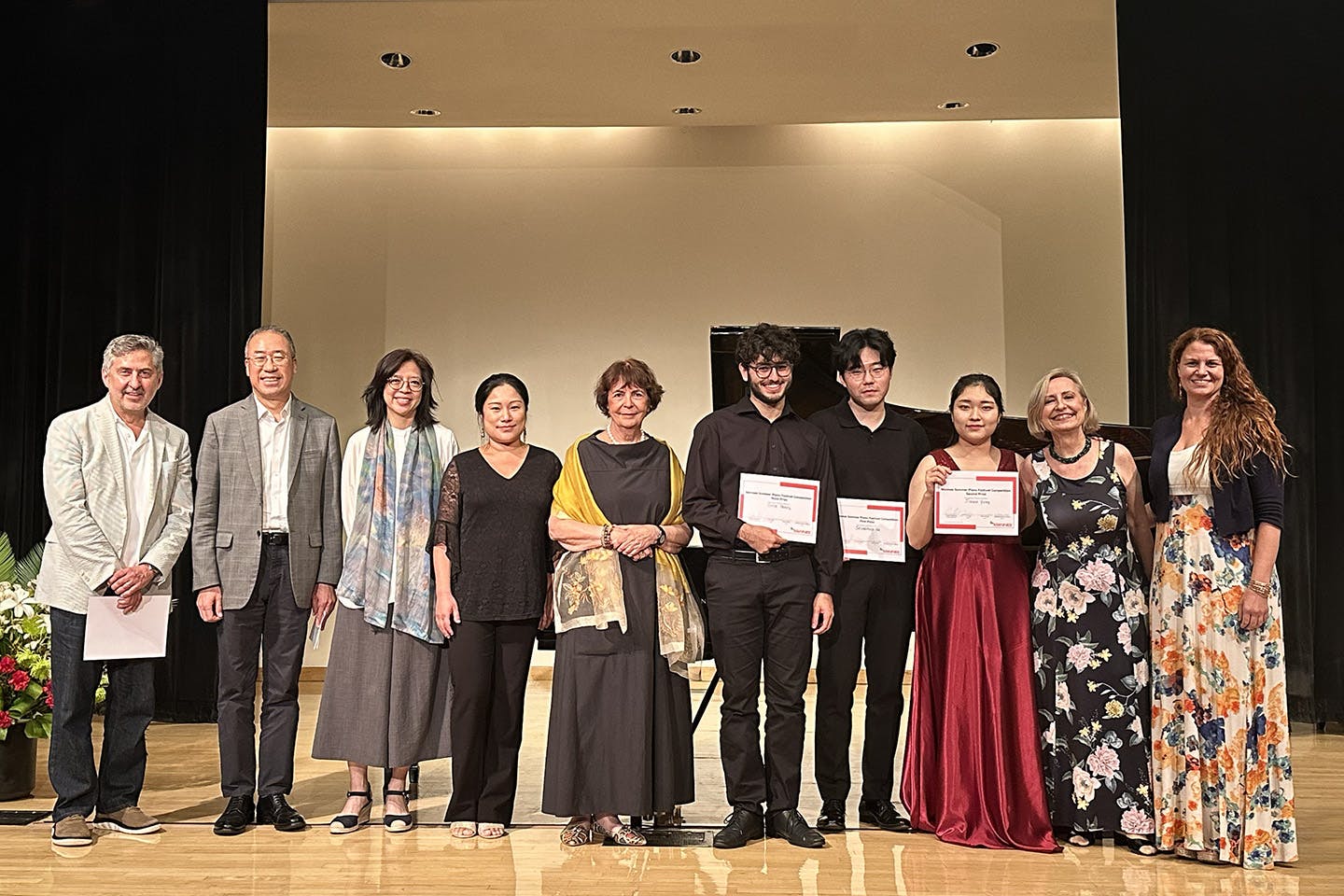 The Mannes Summer Piano Festival inaugural competition winners with the esteemed competition jury. 