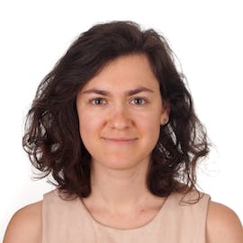 Portrait of NSSR Politics PhD candidate Mariia Shynkarenko.